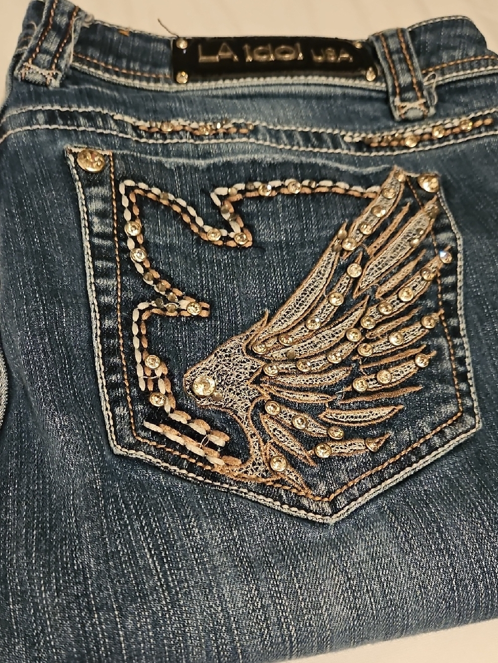 L.A. idol Women's Dark Blue Denim Jeans with Gold Embellished Wing Pocket